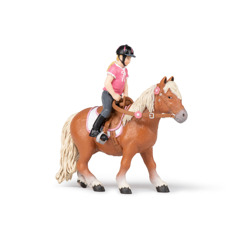 Shetland pony met zadel