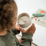 Drinkbeker Learning cup 360° Celebration Sand - Aan tafel Done by Deer - In den Olifant