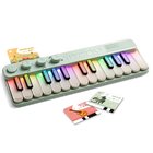 Groene kinderpiano met lichtgevende toetsen - Kidypiano Mini - Muziekinstrumenten Kidywolf - In den Olifant