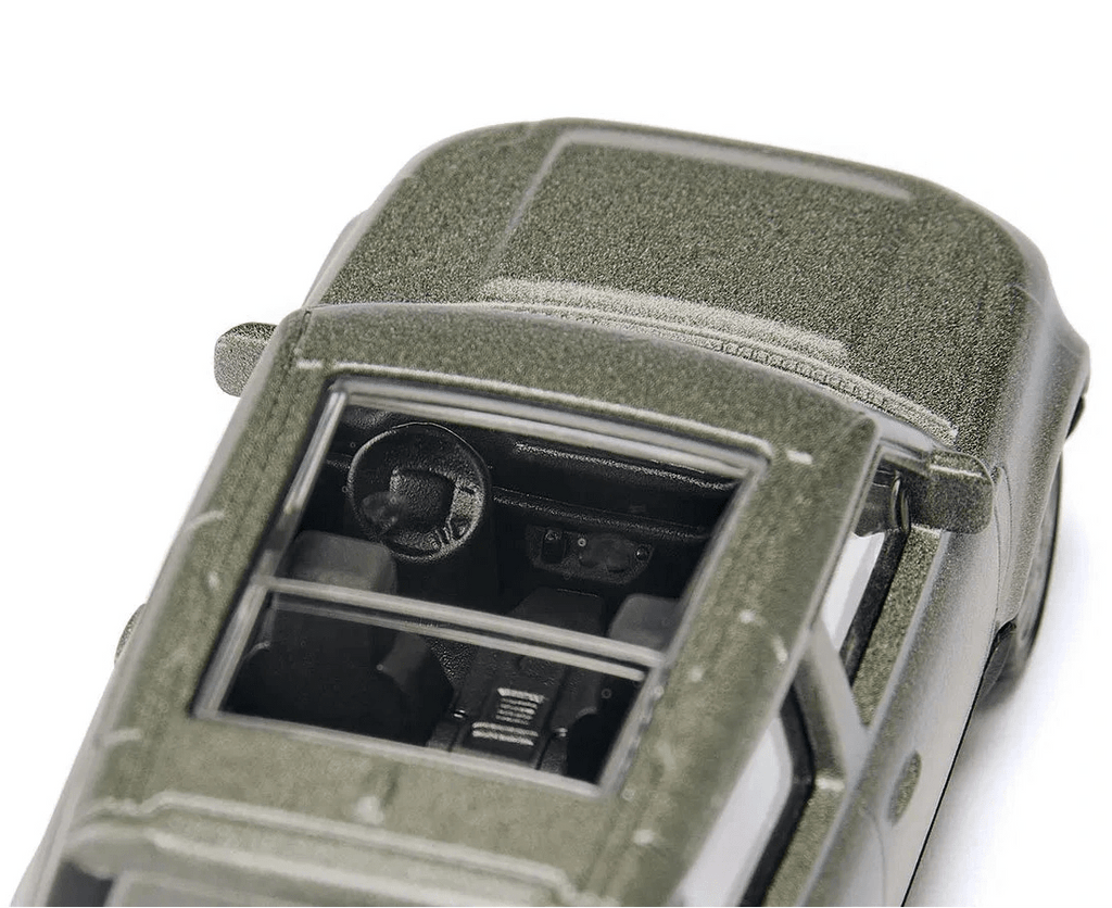 Land Rover Defender 90 - Auto's en voertuigen Siku - In den Olifant