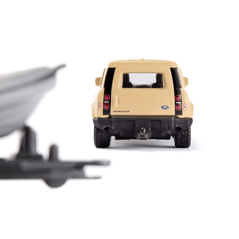 Land Rover Defender Safari met boot - Auto's en voertuigen Siku - In den Olifant