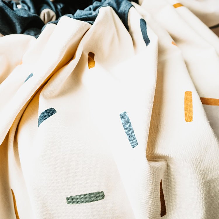 Noomad opbergtas en speeltapijt - Confetti - Opbergers Play&go - In den Olifant