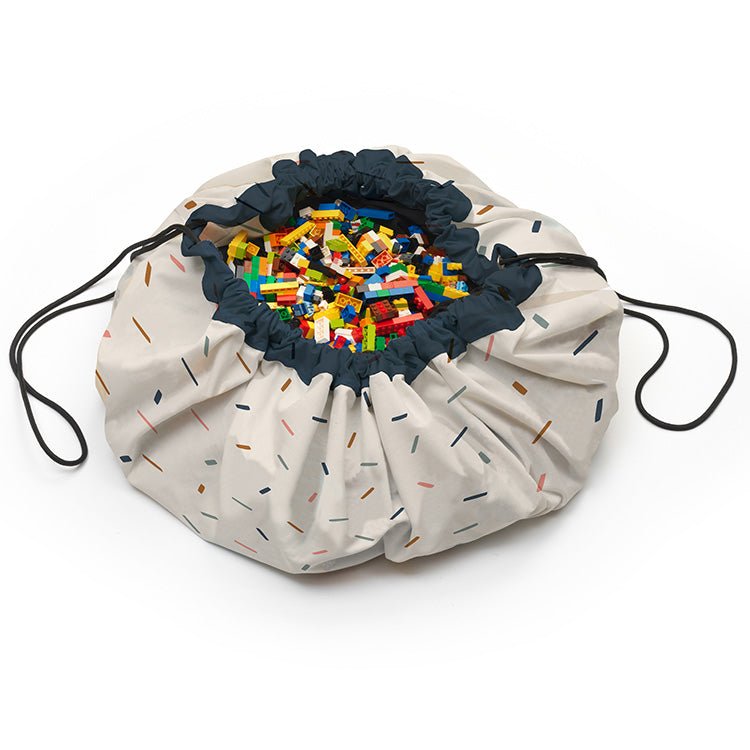 Noomad opbergtas en speeltapijt - Confetti - Opbergers Play&go - In den Olifant