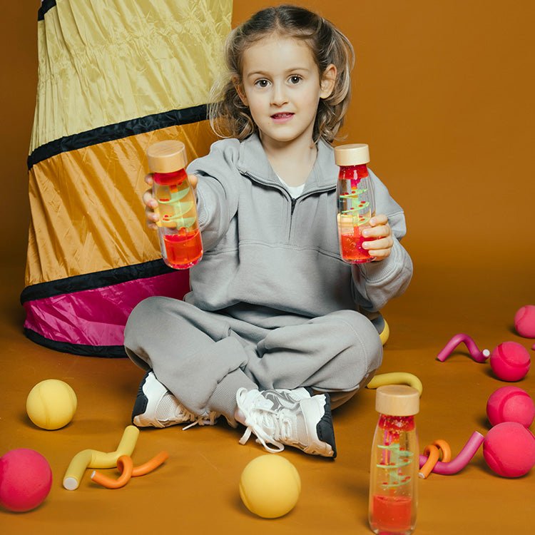 Sensorische Petit Boum fles - Move Bottle Spiral Pink - Sensorisch speelgoed Petit Boum - In den Olifant