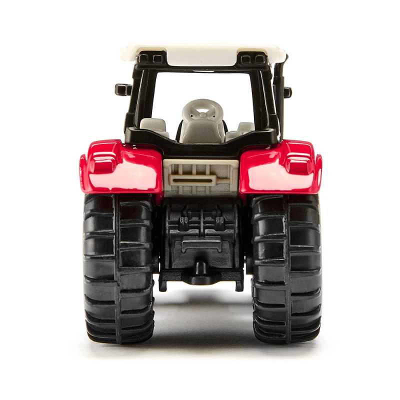 Steyr tractor met Krampe aanhanger - Auto's en voertuigen Siku - In den Olifant