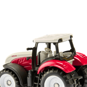 Steyr tractor met Krampe aanhanger - Auto's en voertuigen Siku - In den Olifant